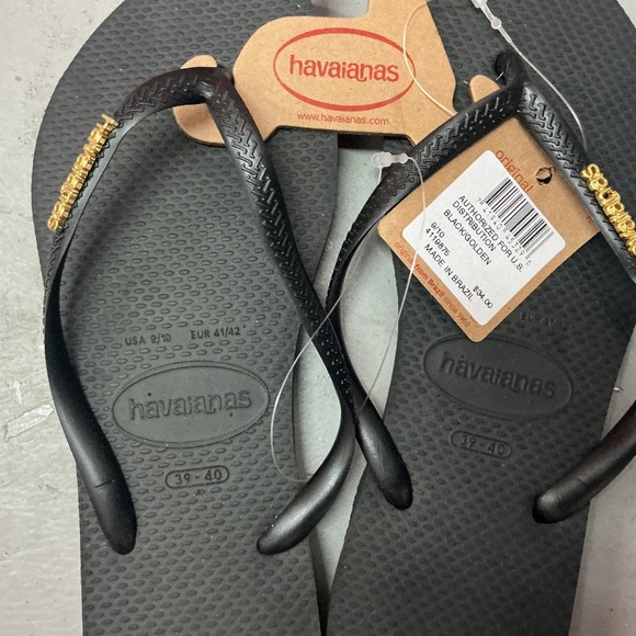 NWT Havaianas Slim Black/Golden Flip Flops with Metallic Pop-Up Logo on Strap - Picture 2 of 2
